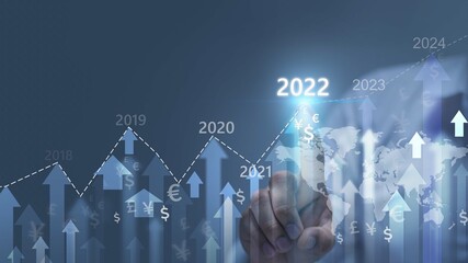 Wall Mural - Concept of planning and strategy. Stock market. Business growth. progress or success idea A business man or trader is showing a growing virtual hologram stock. Invest in trading in 2022-2024