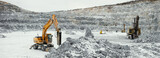 Fototapeta  - Panorama of a limestone quarry with heavy mining machinery - hydraulic hammer, excavator and drilling rig, on a cloudy winter day.