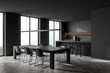 Minimalist dark grey kitchen with linear light. Corner view.