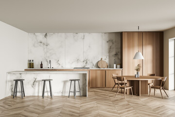 Minimalist white marble kitchen with home bar and dining table