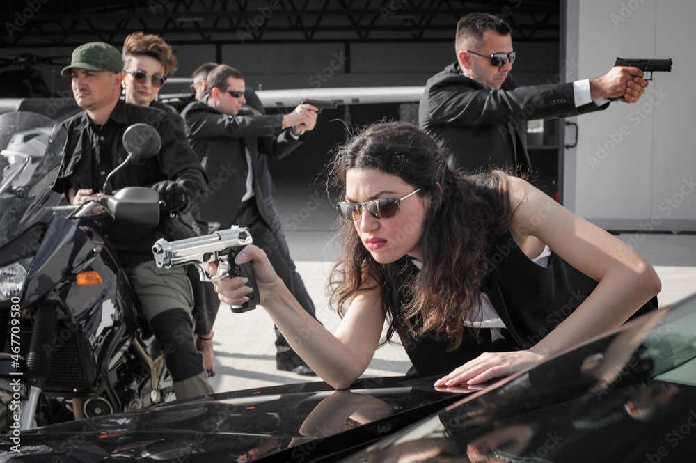 Tactical exercise training. An armed bodyguard security team protects ...
