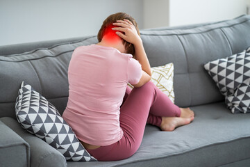 Wall Mural - Neck pain, woman suffering from backache at home