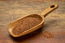 Rooibos Tea, Made From The South African Red Bush, Naturally Caffeine Free - Vintage Wooden Scoop On Rustic, Weathered Wood