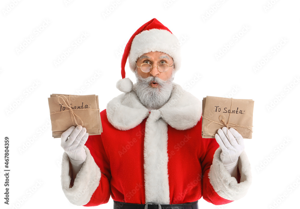 Surprised Santa Claus with letters on white background