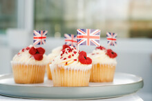 Cupcake With British Union Jack Flag And Poppy Flower. Remembrance Day. Selective Focus, Copy Space.