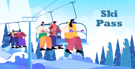 Wall Mural - people sitting on chairlifts ski resort cableway in snowy mountains christmas new year holidays celebration winter vacation