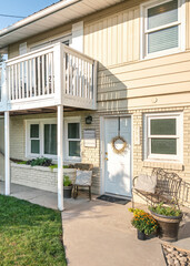 Wall Mural - Vertical Traditional two strorey house exterior with balcony