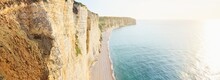 Picturesque Panoramic Aerial View Of The Etretat White Cliffs At Sunset. Dramatic Sky, Azure Water. Summer Vacations In Normandy, France. Travel Destinations, National Landmark, Sightseeing, History