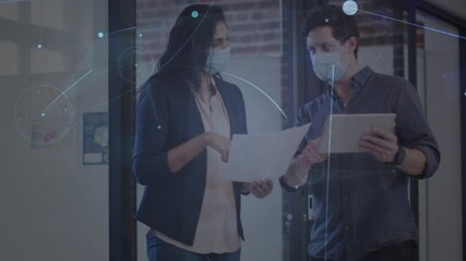 Poster - Animation of glowing network over male and female colleague in face masks talking in office