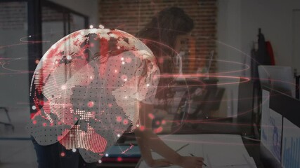 Wall Mural - Animation of glowing global network over creative businesswoman using computer in office