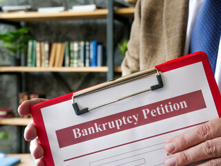 Wall Mural - Manager proposes bankruptcy petition form for signing.