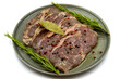 © enezselvi - Marinated beef ribeye on a white background. Beef entrecote marinated with olive oil and various spices