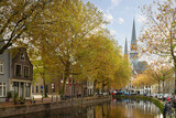 Fototapeta  - Church (Gouwekerk)  located on the Hoge Gouwe canal in the center of Gouda.
