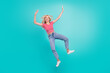 © deagreez - Photo of funny sweet young lady wear striped t-shirt jumping falling smiling isolated turquoise color background