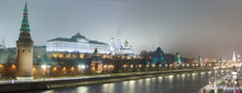 Moscow, Russia.  Night Panoramic View Of The Kremlin: Embankment, Towers, Temples, Great Kremlin Palace. November, Foggy Weather.