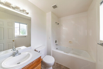 Wall Mural - Bathroom interior with window and shower tub with acrylic wall panel