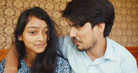 Wall Mural - Portrait of a South Asian couple talking