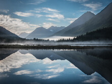 The Chugach Mountains Are Reflected In Tern Lake On Alaska's Kenai Peninsula. 