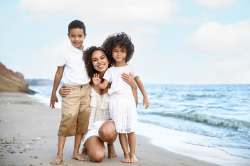 Sticker - African-American children with mother on sea beach