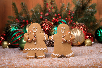 Wall Mural - Family of Gingerbreads with 2 kids on Holiday Christmas Background