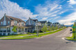 © Jason - Row of large two-storey houses near the paved uphill road at Daybreak, Utah