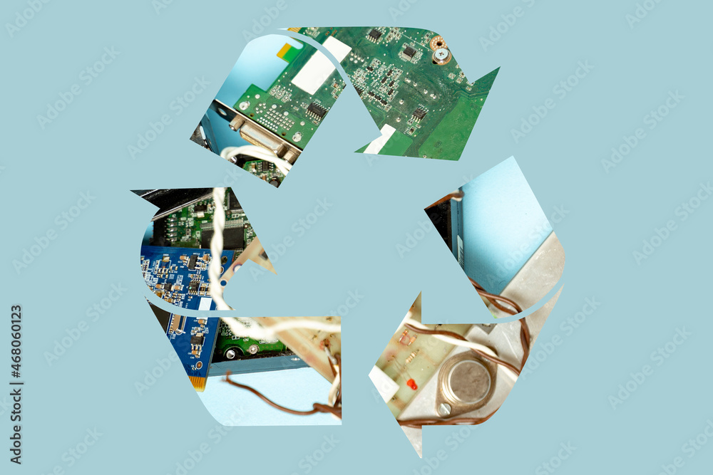 Old electronic parts inside of recycle symbol, on clean background, e ...