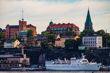 Cruise Ship Parked In Front Of Beautiful, Traditional Buildings On The Katarina-Sofia Island In Stockholm, Sweden
