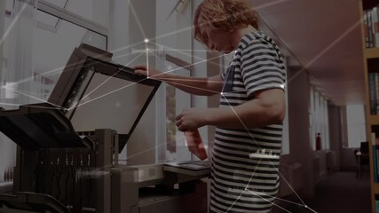 Poster - Animation of network of connections over male student using copying machine