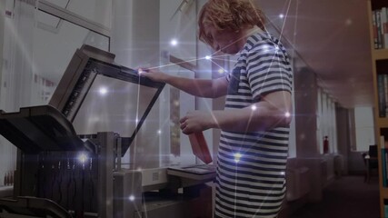 Poster - Animation of network of connections over male student using copying machine