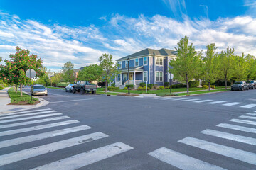 Crosswalk at the intersection road in a residential area at Daybreak, Utah