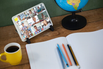 Sticker - Smiling diverse elementary school pupils during class on tablet screen