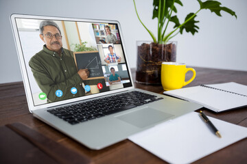 Sticker - Smiling diverse elementary school pupils with teacher during class on laptop screen