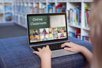 Sticker - Caucasian girl using laptop for video call, with smiling diverse elementary school pupils on screen