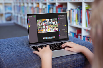 Poster - Caucasian girl using laptop for video call, with smiling diverse elementary school pupils on screen