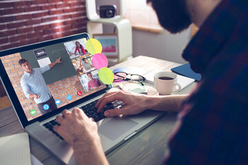 Sticker - Caucasian man using laptop for video call, with smiling diverse high school pupils on screen