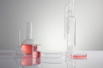 Scientist with chemical reaction in chemistry laboratory. close up of scientist making research in lab in white background , red water in test tube and blank space for advertising , front view