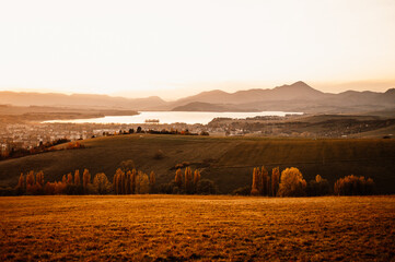 Sunset over Liptov region in the backround with Liptovska mara lake and  tatras mountains around. Liptovsky mikulas landspace, slovakia