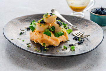 Scallops with butternut squash mash, caviar and lime and butter sauce