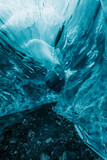 Fototapeta  - blue ice cave of Iceland glacier vertical photo