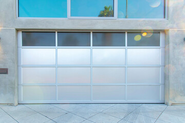 SIlver modern garage door exterior at Oceanside, California