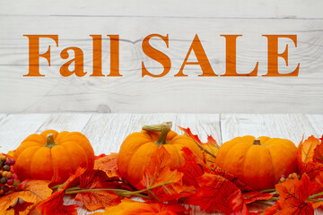 Wall Mural - Fall Sale message with fall leaves and pumpkins