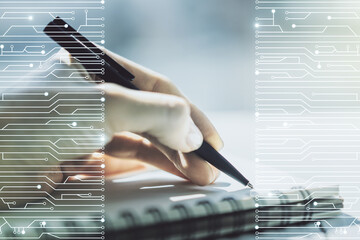 Poster - Creative concept of microscheme illustration and woman hand writing in notebook on background. Big data and database concept. Multiexposure