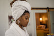 © Creative Flame - Woman in bathrobe and towel wrapped around head