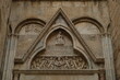 Tympanum and portal of the transept. Decorations on the stone of the cathedral of Cagliari..