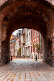 Fototapeta Uliczki - Helpoort stone gate of the old city walls of Maastricht, Netherlands