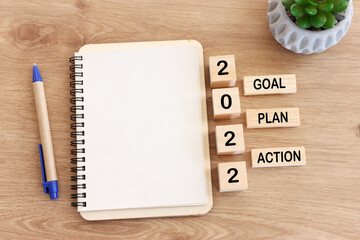 Wall Mural - Top view image of note with the text 2022 and the words – goal plan action