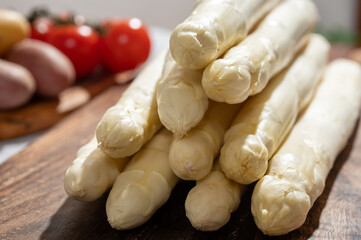 Wall Mural - New harvest of high quality German white asparagus washed, uncooked, tasty vegetarian dinner