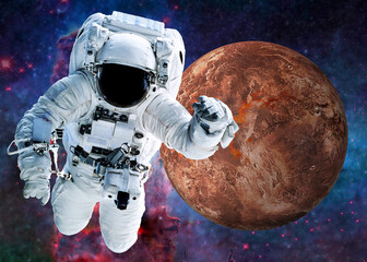 Wall Mural - astronaut near fiction red planet mars somewhere in space. selective focus. science fiction. element