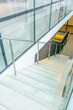 © karamysh - White staircase. Abstract fragment of the architecture of modern lobby, hallway of the luxury hotel, shopping mall, business center in Vancouver, Canada. Interior design.