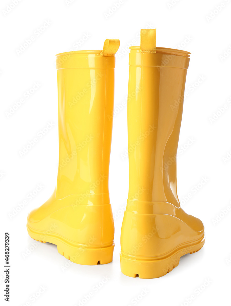 Yellow rubber boots isolated on white background
